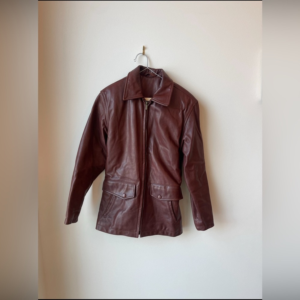Vintage red leather coach jacket size xs, color is almost maroon